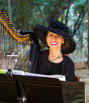 Harpist Anne Roos Playing in a Forest