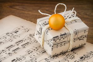 Gift wrapped in music paper